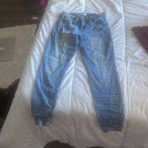 Light wash mid rise skinny jeans